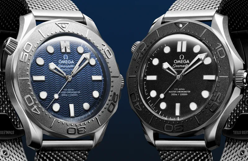 Omega Seamaster Diver 300M James Bond edition with blue dial next to the Spectre edition with black dial