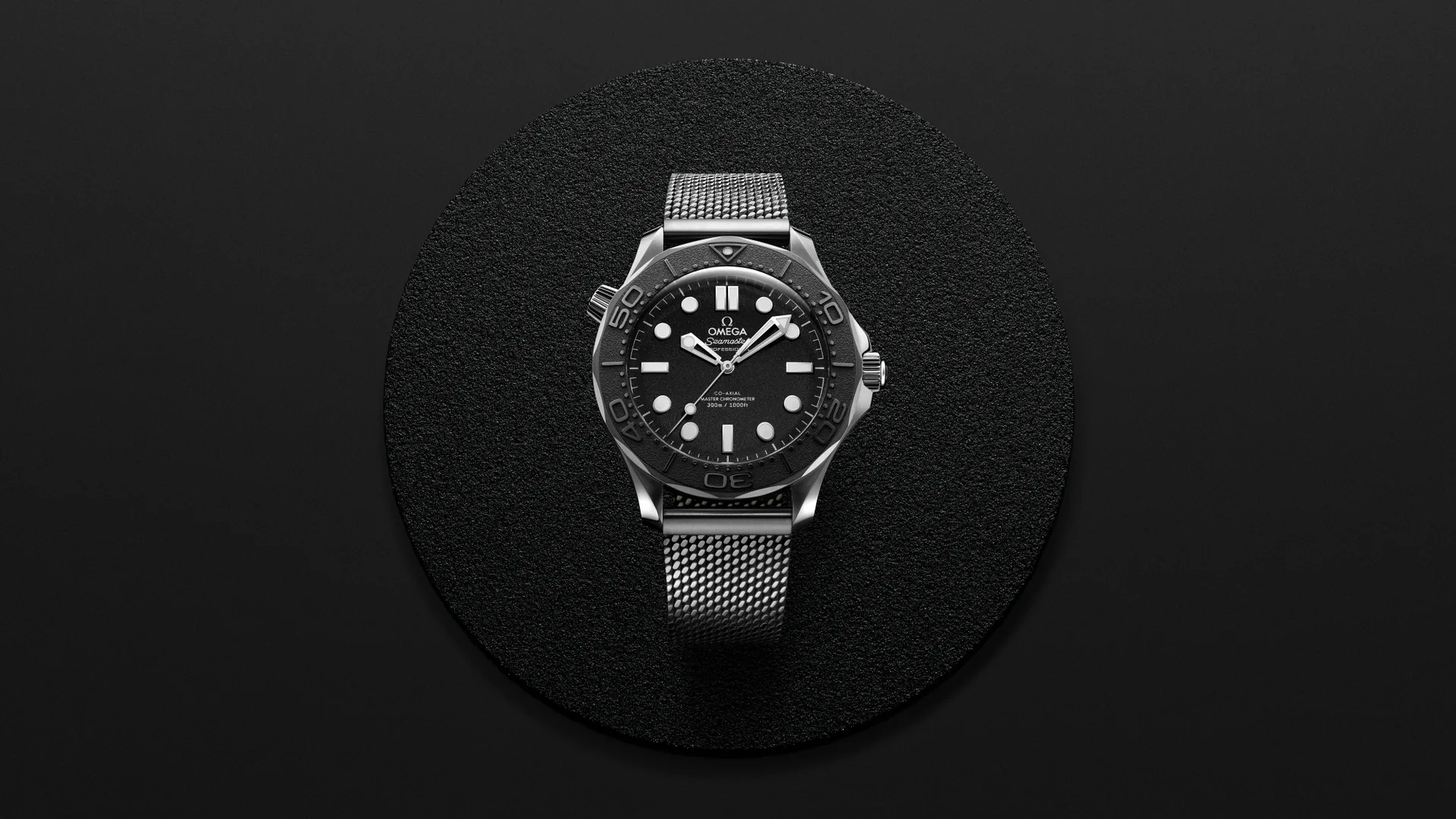Omega Seamaster Diver 300M Spectre edition in stainless steel with black grained dial on a mesh bracelet