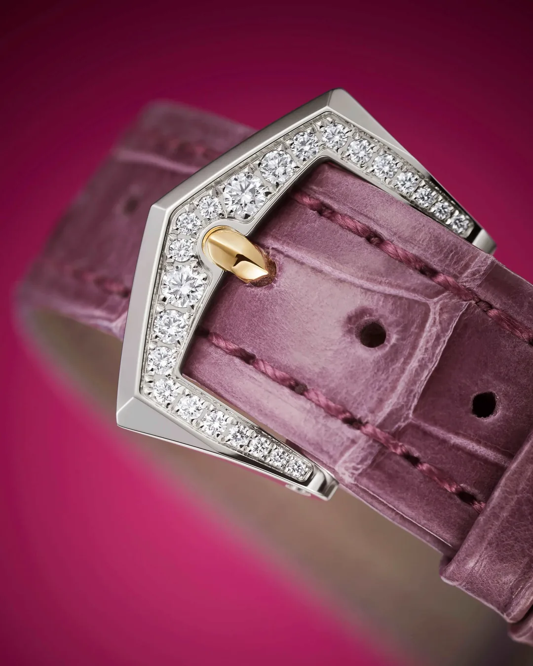Diamond-set prong buckle of a Patek Philippe Gondolo Ladies First on a purple alligator strap